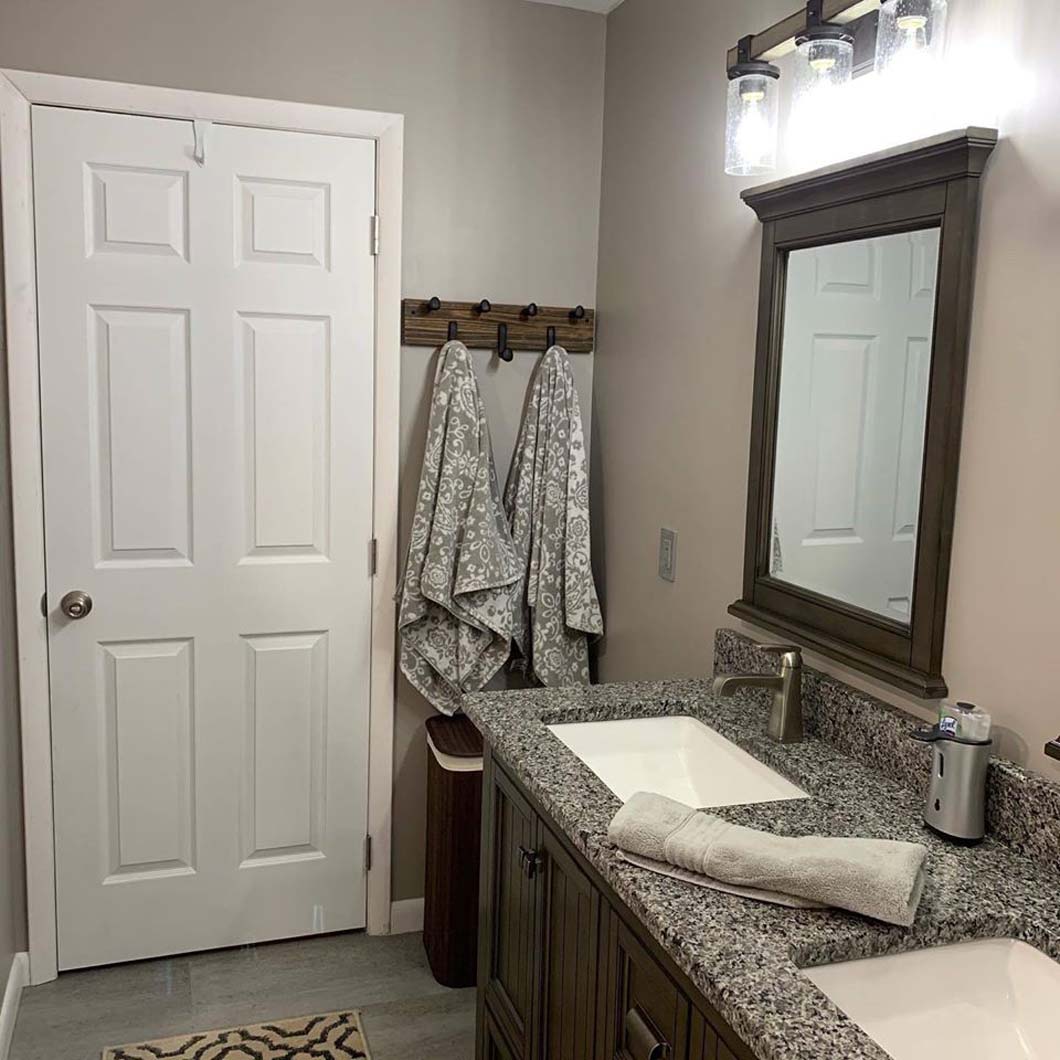 Granite bathroom countertop in bathroom designed by Weinstein Allentown Bath & Kitchen Design Services