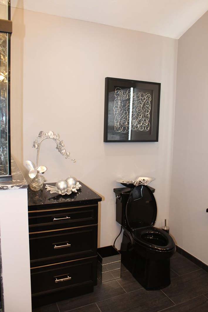 Bkack toilet and vanity in bathroom designed by Weinstein Allentown Bath & Kitchen Design Services