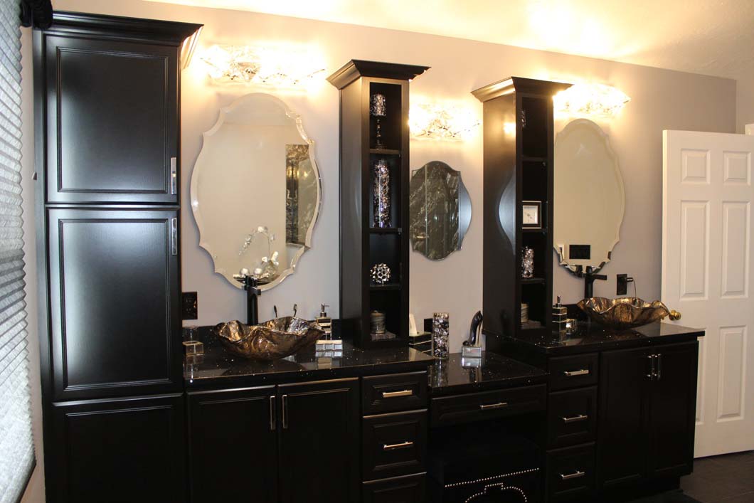 Wood cabinents and vanity with sinks and mirrors in bathroom designed by Weinstein Allentown Bath & Kitchen Design Services
